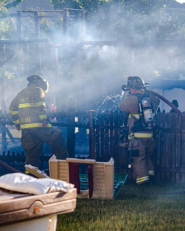 Backyard house fire in Joliet, IL